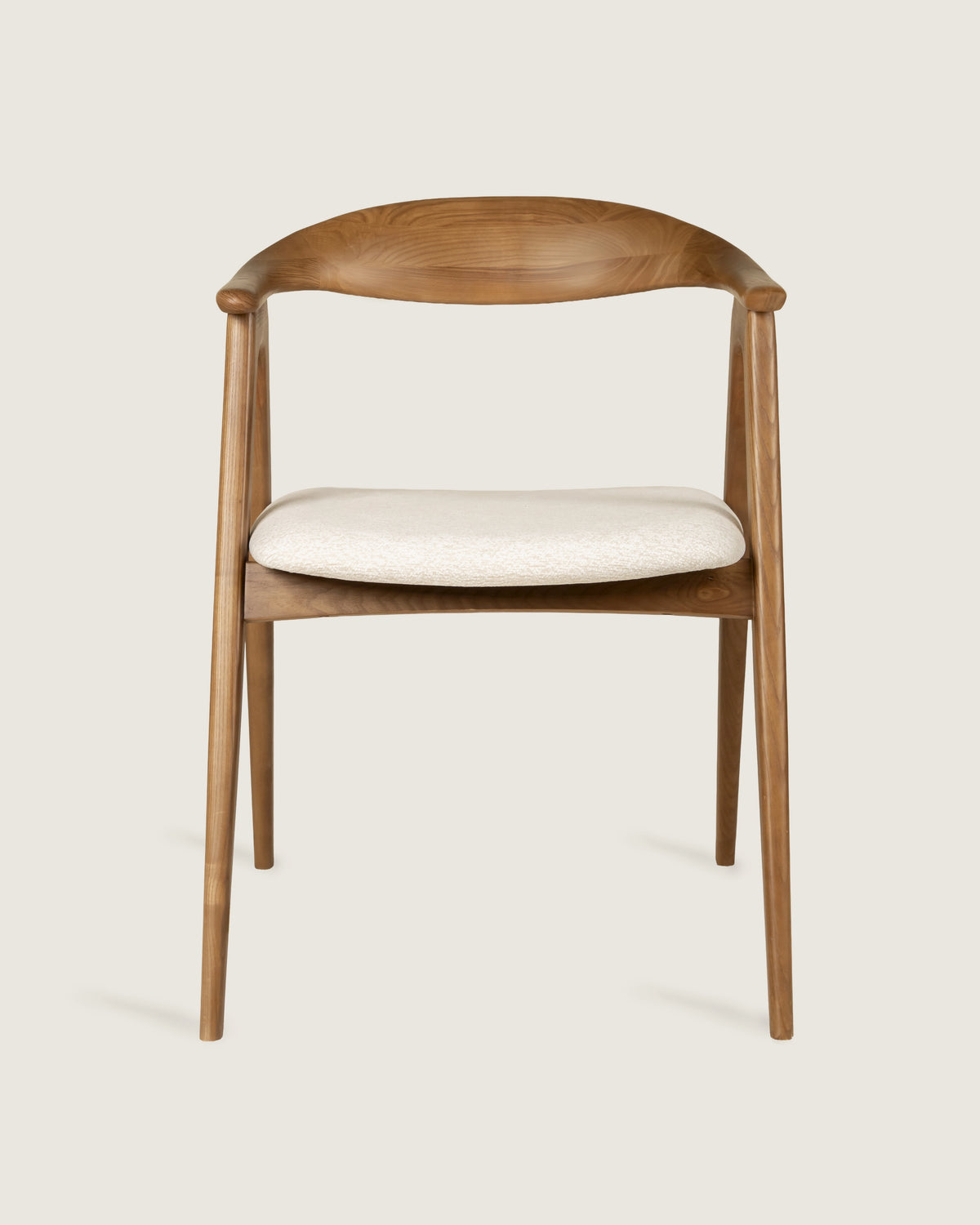 Lyra chair in different wood finishes with eos cream upholstery