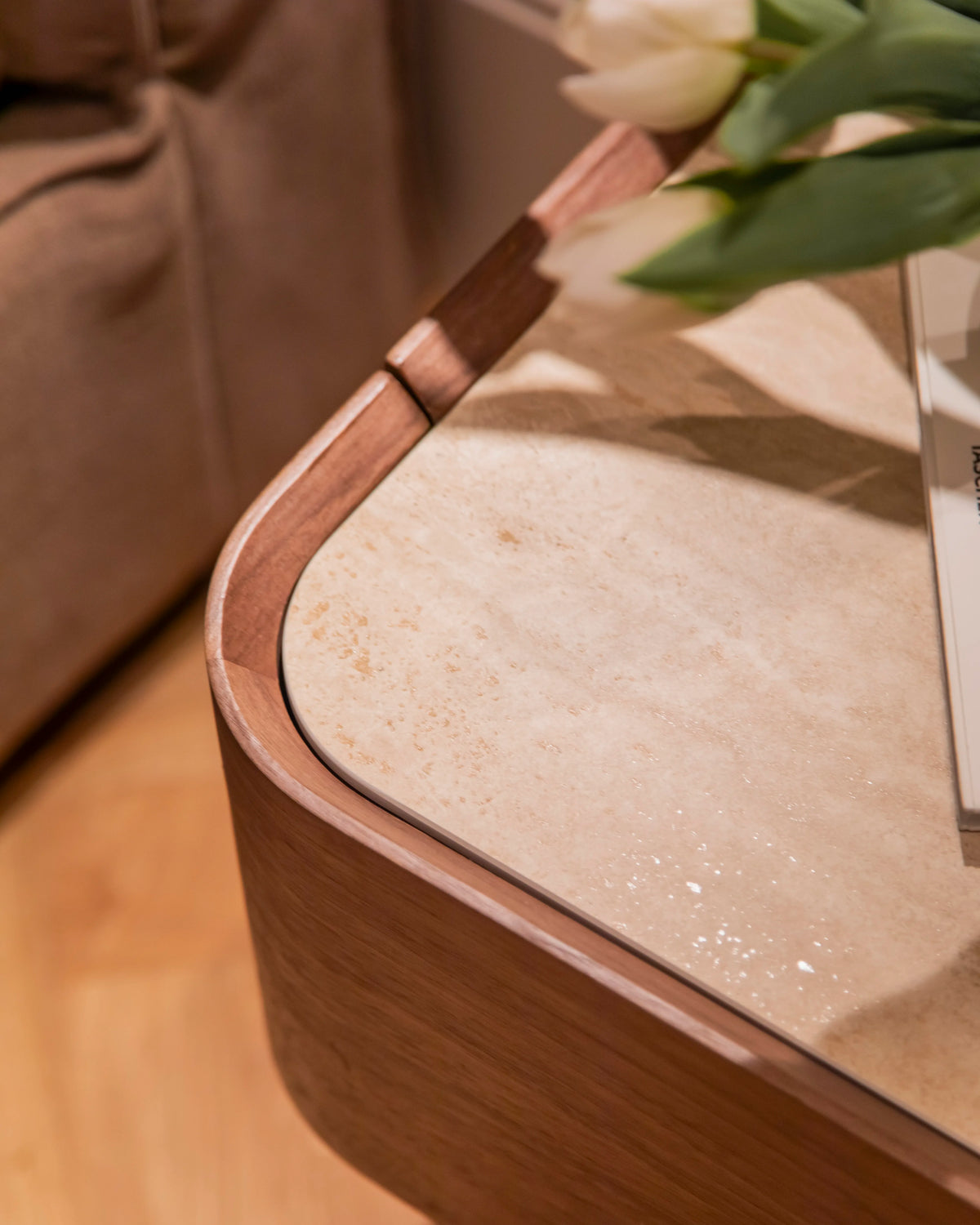 Avril side table in different wood finishes with a travertine marble top