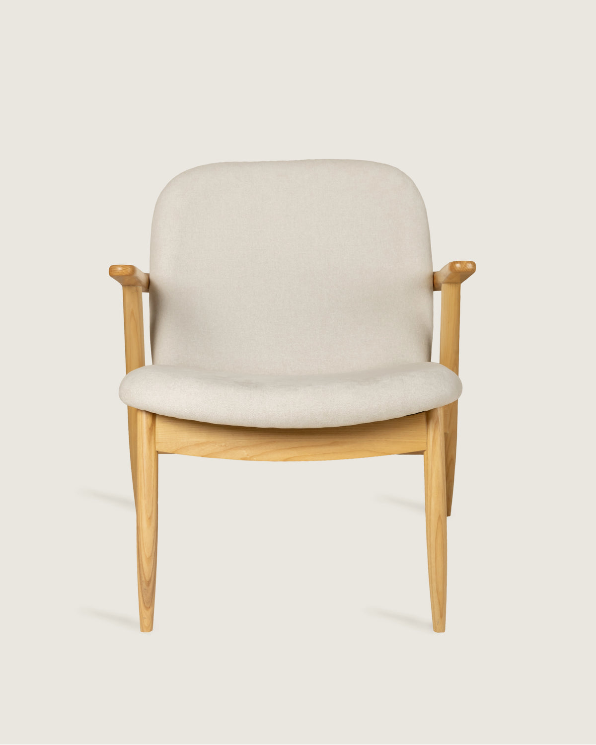 Lys armchair with wooden frame and vita creme upholstery