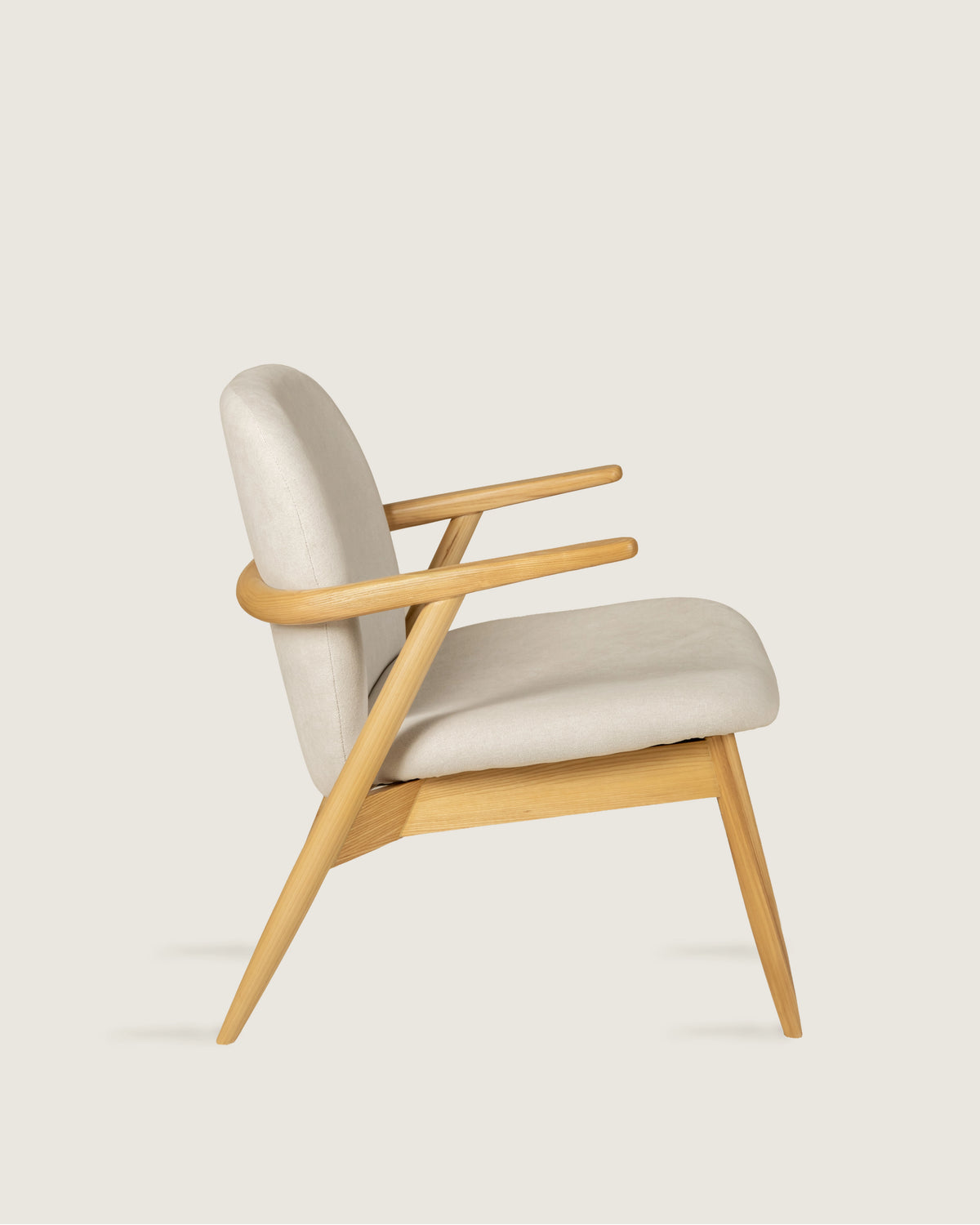 Lys armchair with wooden frame and vita creme upholstery