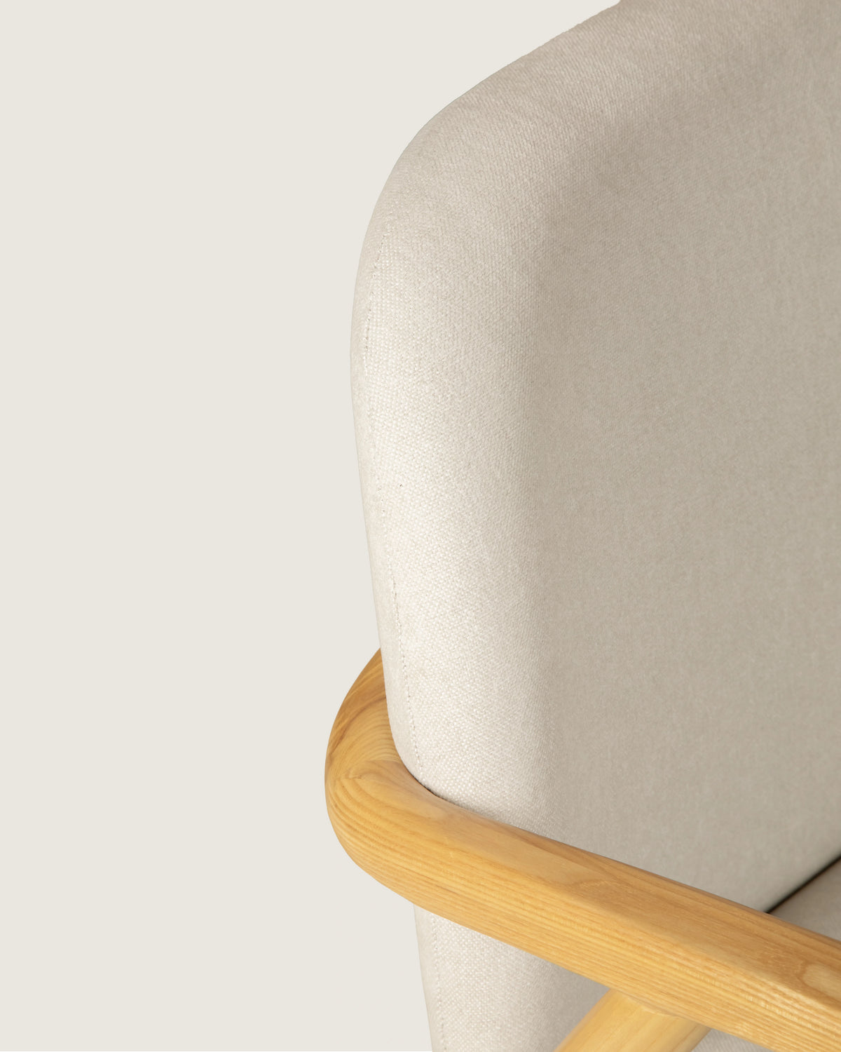 Lys armchair with wooden frame and vita creme upholstery