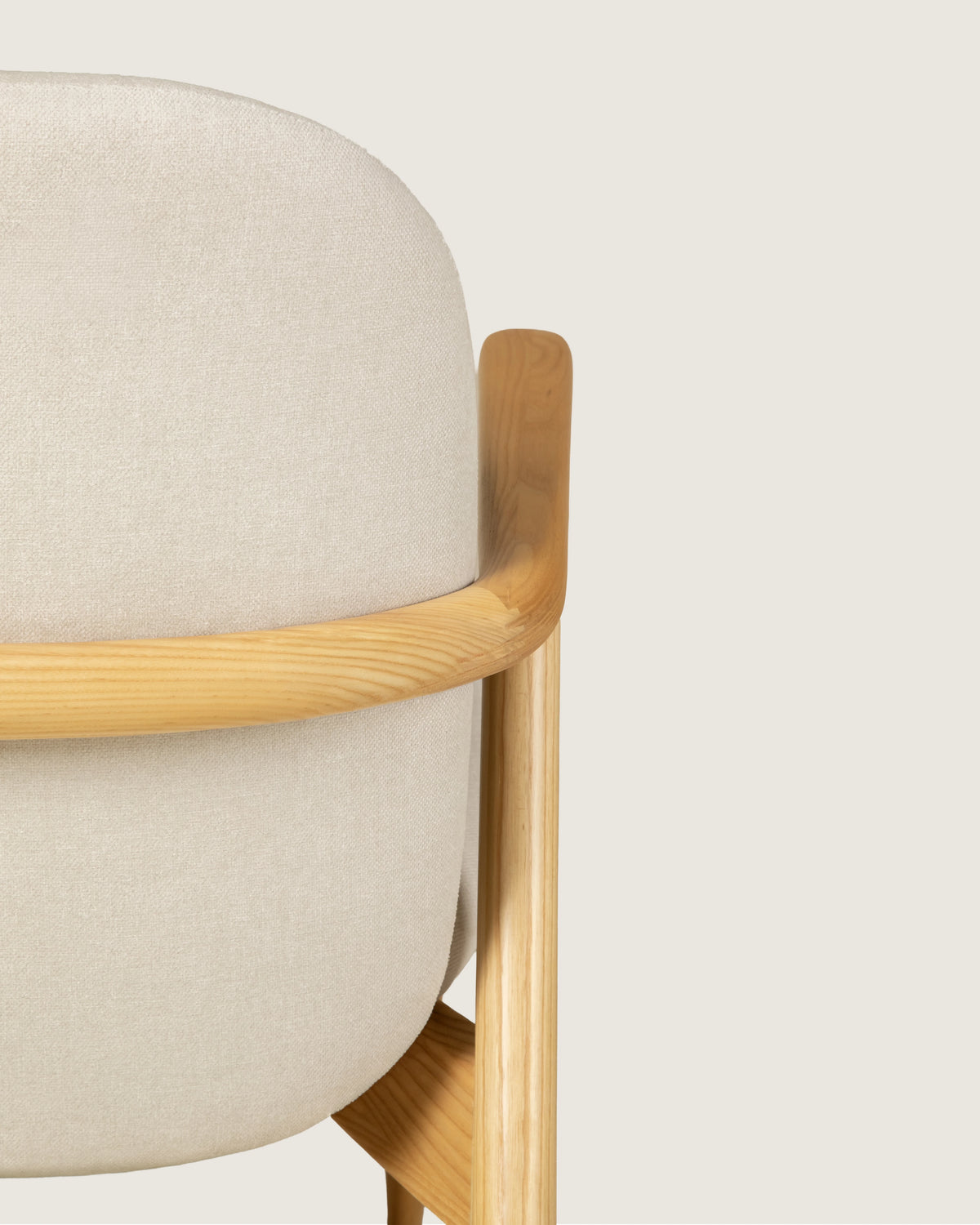 Lys armchair with wooden frame and vita creme upholstery