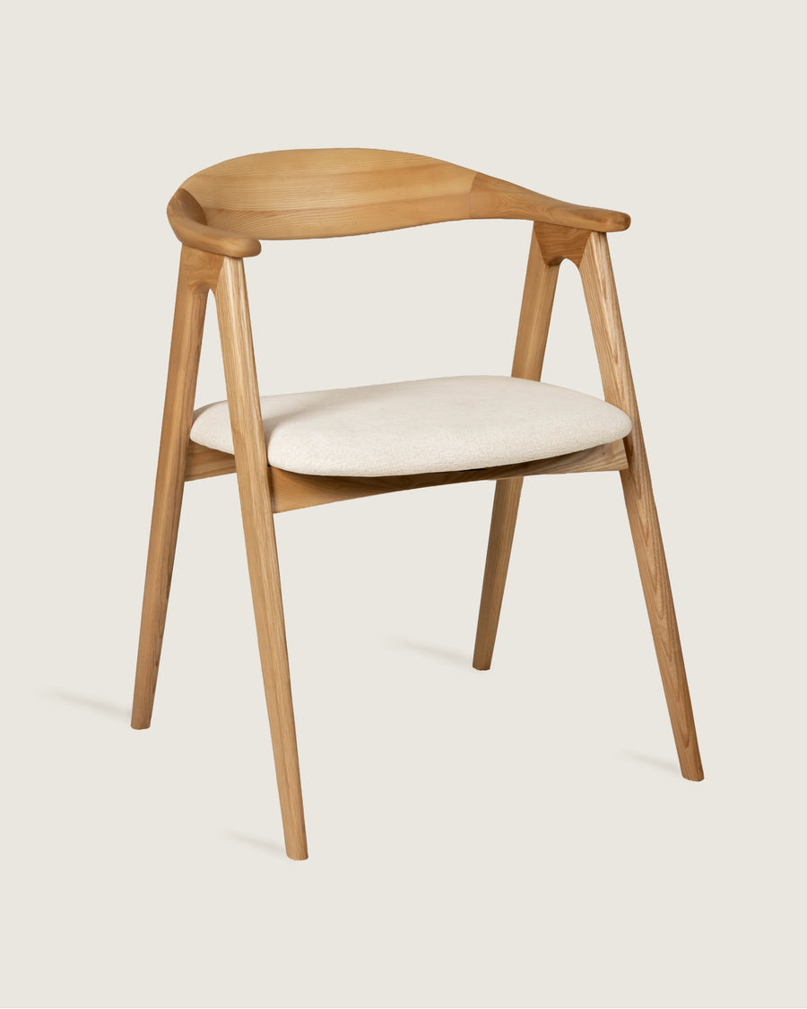 Lyra chair in different wood finishes with eos cream upholstery