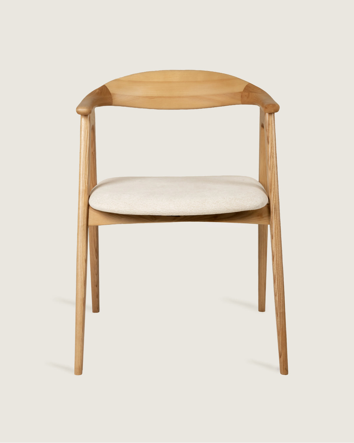 Lyra chair in different wood finishes with eos cream upholstery