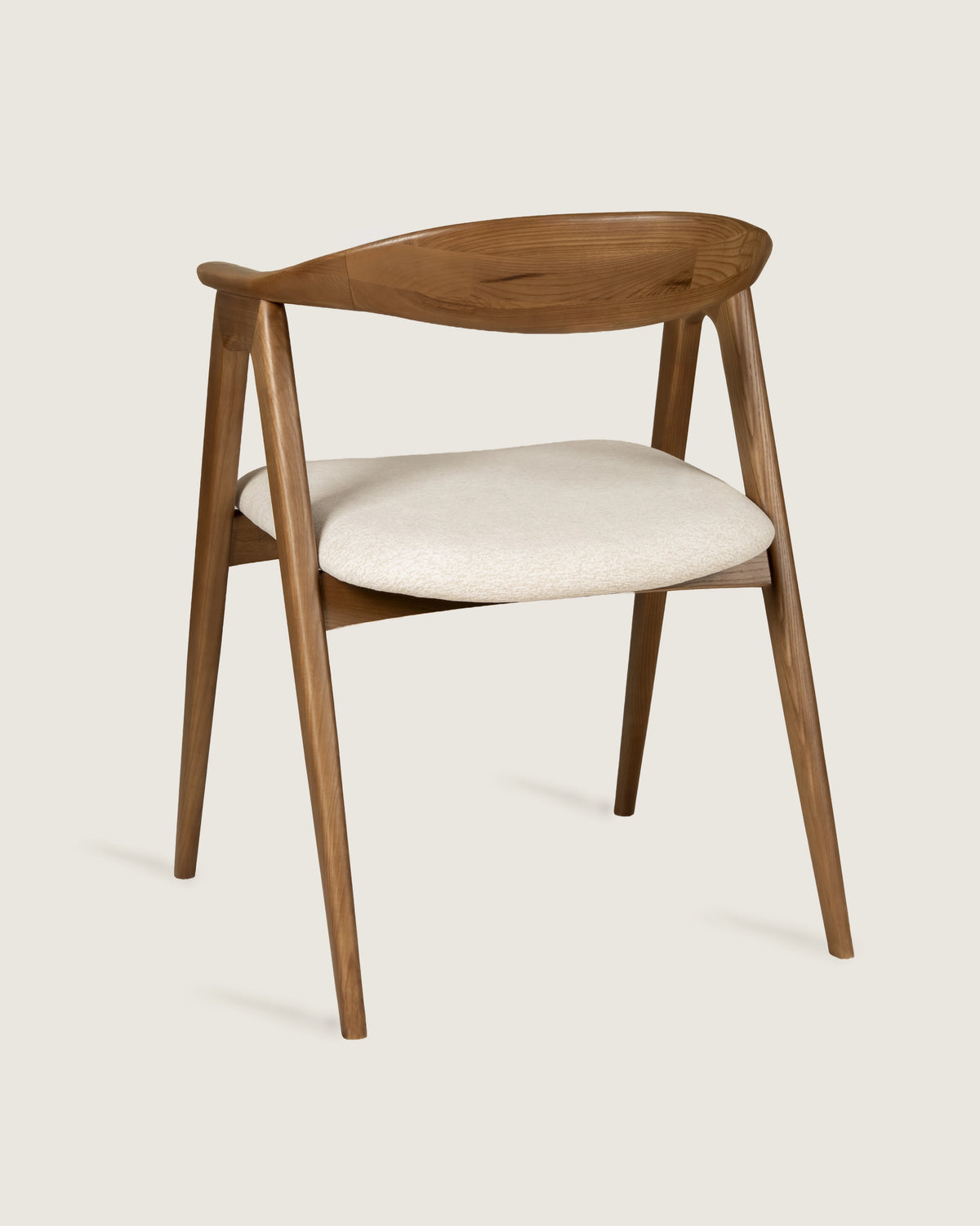 Lyra chair in different wood finishes with eos cream upholstery