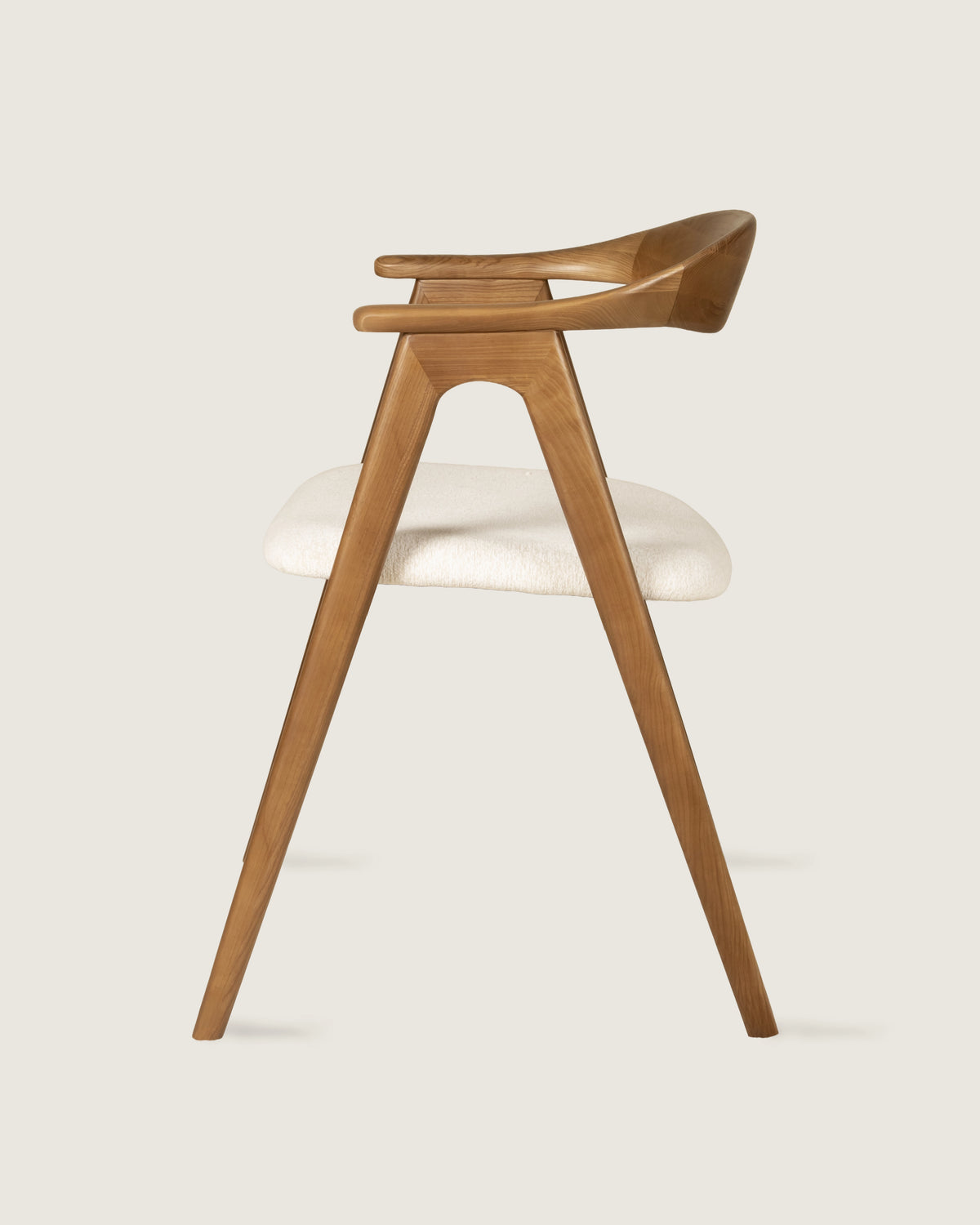 Lyra chair in different wood finishes with eos cream upholstery
