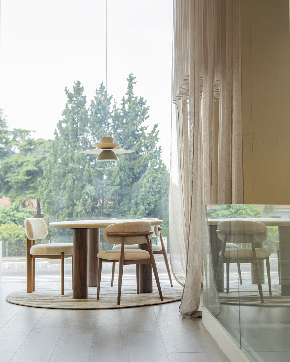 Vilma dining table made of microcement with a liquid stone finish in natural color