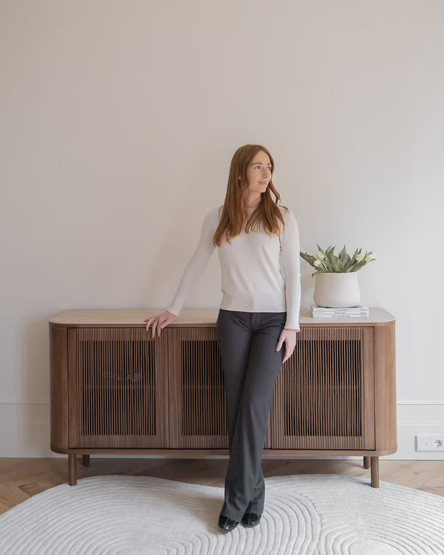 Ivy sideboard in different wood finishes with a travertine marble top