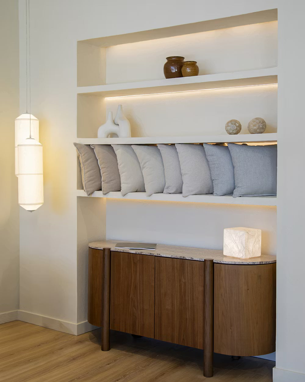 Lily  sideboard in different wood finishes with a travertine marble top