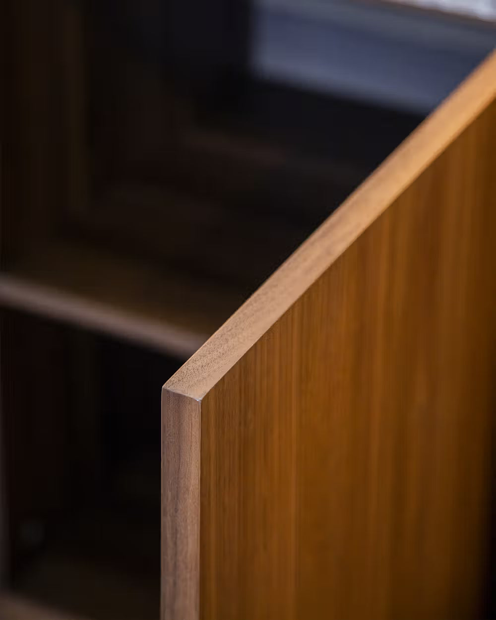 Lily  sideboard in different wood finishes with a travertine marble top
