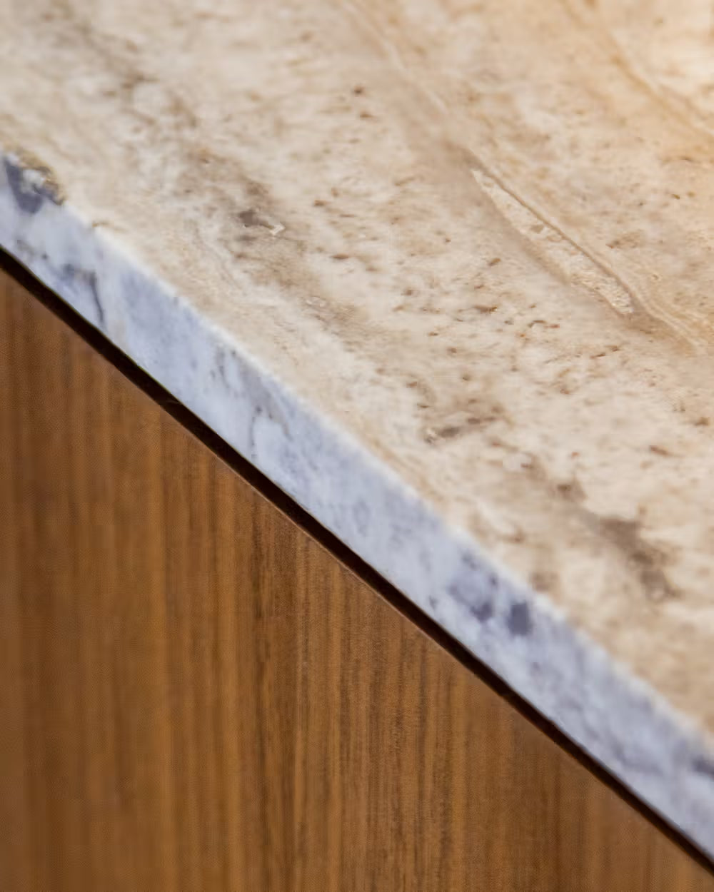 Lily  sideboard in different wood finishes with a travertine marble top