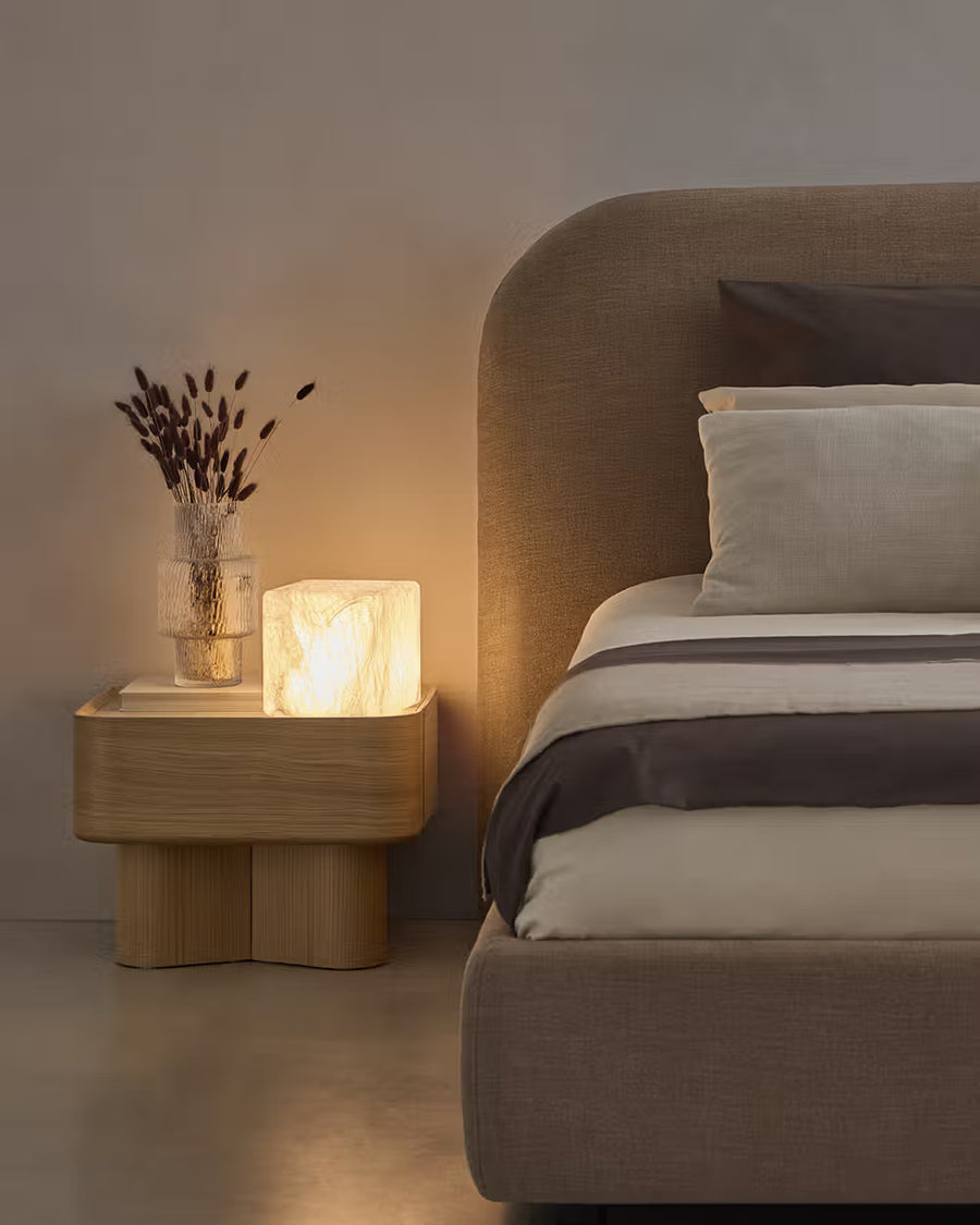Avril side table in different wood finishes with a travertine marble top
